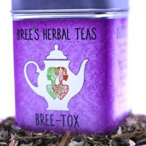 Herbal Detox Tea in a purple tea container with a white teapot on it