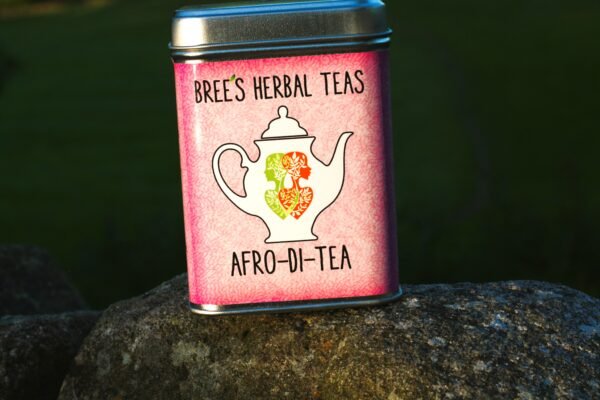 Balance female Hormone tea in a Pink tin on a wall